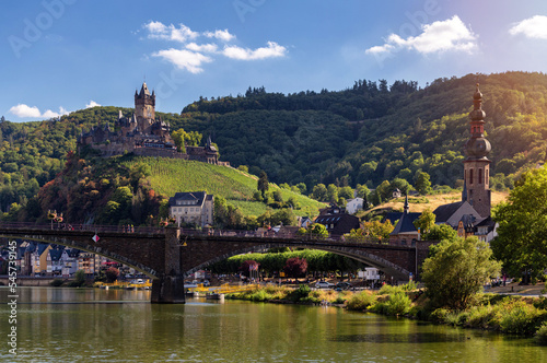 Cochem, Germany, beautiful historical town on romantic Moselle river, city view with Reichsburg castle on a hill in autumn color