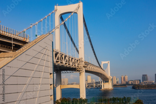 Sunny view of the Rainbow Bridge and cityscape