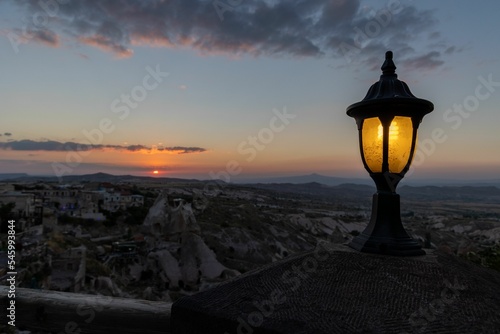 Old lamp overlooking the city of Cappadocia, Turkey during sunset