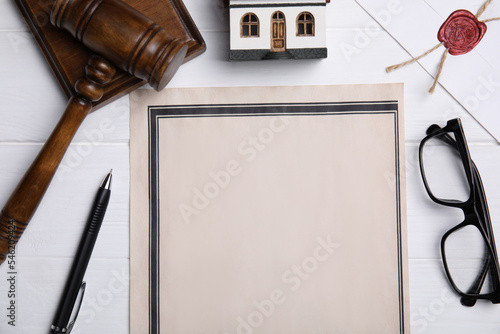 Flat lay composition with last will and testament on white wooden table