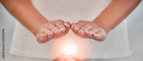 Hands, light energy and chakra healing for spa healthcare and luxury wellness. Woman palm, reiki therapy and spiritual aura expert or healthy power balance for calm lifestyle with body wellbeing