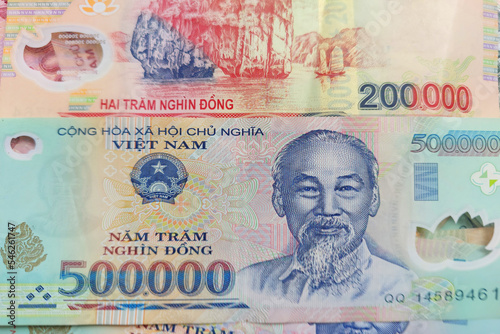 Vietnamese dong banknotes close-up. Money background. Vietnamese currency - dongs. Pattern texture and background of Vietnam dong money, currency banknotes ready for exchange and business investment