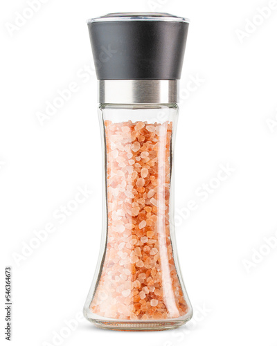 Salt grinder or mill. Glass and stainless steel mill with pink Himalayan salt. Kosher, coarse grain. High resolution macro photo. Isolated white background. 
