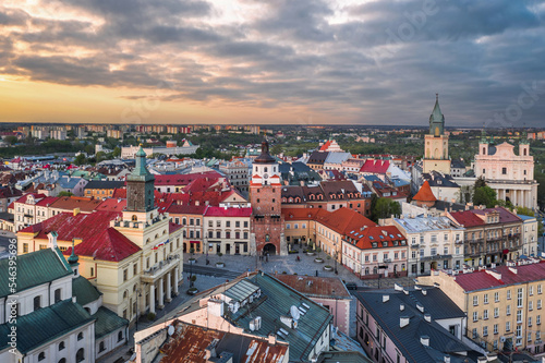 Beautiful panoramic skyline cityscape of Lublin, Lesser Poland. Aerial view of Królewska street and the old town landmarks at sunset: Cracow Gate (Brama Krakowska), Town hall (Ratusz), Cathedral