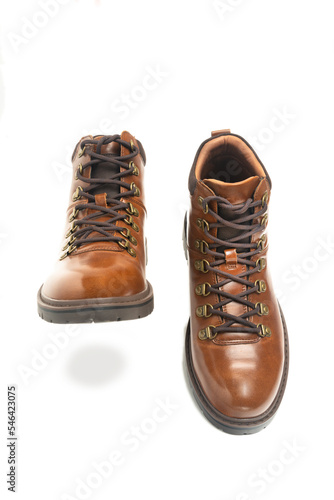 walking men's boots with lacing on a white background