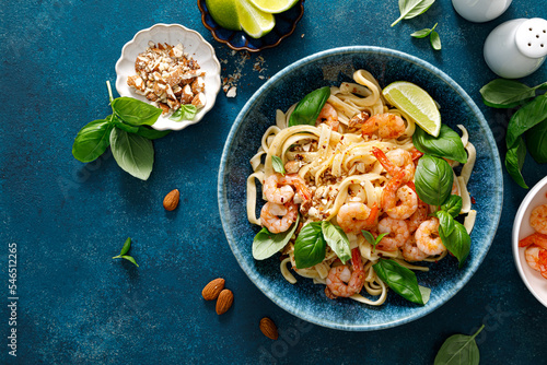 Pasta with shrimp and basil, noodle with shrimp, top view