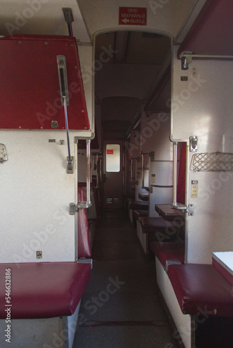 Soviet couchette car is a railway carriage conveying non or semi-private sleeping accommodation. The inscription on the sign translates to "Emergency exit" 