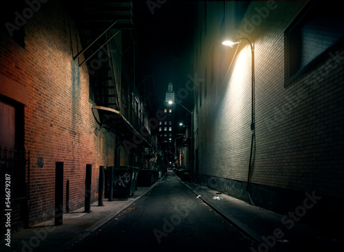 Corner street in the city new york city dark night afternoon street photography walking tourism urban exploration discover adventure fon route path leak flare light blue sky among buildings