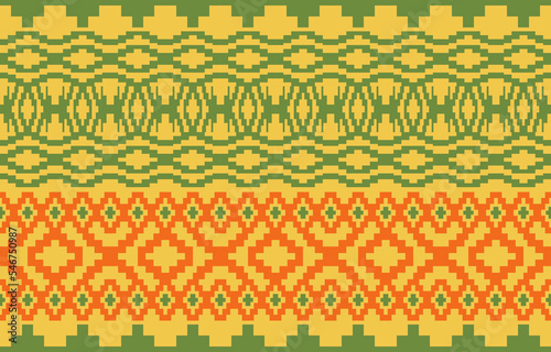 Design with geometric yellow orange and green color elements. Fabric seamless ethnic pattern traditional home or wallpaper. Design for textile, wrapping paper, wallpaper, clothing, background, batik.