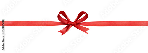 A large red ribbon bow in the centre of a long straight piece of ribbon to be used as a birthday or Christmas banner, border isolated against a transparent background