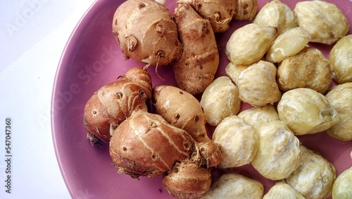 Kemiri and aromatic ginger is herbs and spices from asian for cooking or herbal drink