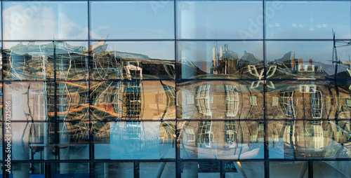 Reflection of Edinburgh downtown in window