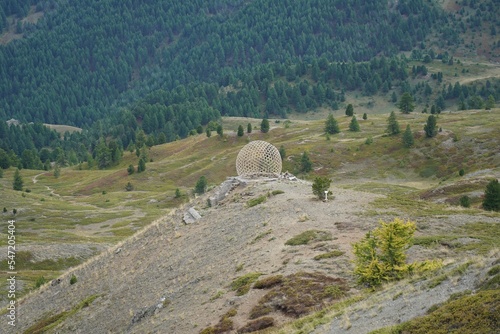 High-angle shot of a sphere on hill. Claviere, Italy.