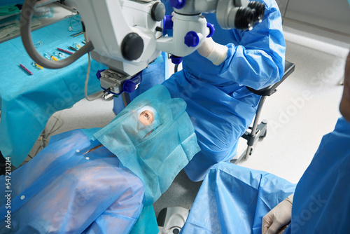 Surgeons preparing for eye operation in the hospital