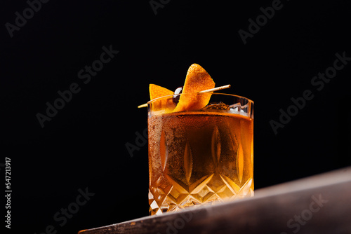 old fashioned cocktail classic bourbon whiskey and bitters, orange peel and cherry as garnish