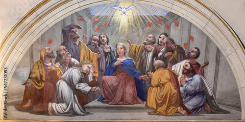 ANNECY, FRANCE - JULY 11, 2022: The fresco of Pentecost in church Notre Dame de Lellis by J. Srellio (1948).