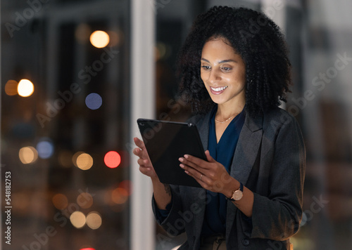 Night business, black woman and tablet for communication, marketing and data analytics online with smile for success, achievement and benchmarking results. Entrepreneur with technology for innovation