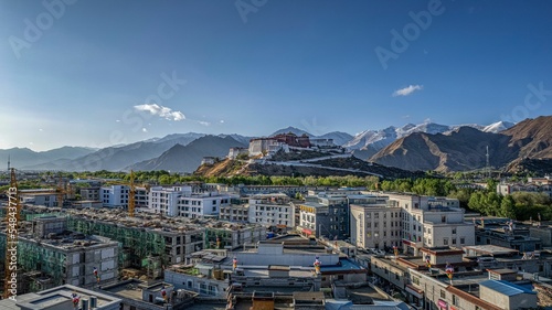 Ancient Potala Palace on a hill from the buildings in Lhasa, Tibet,China