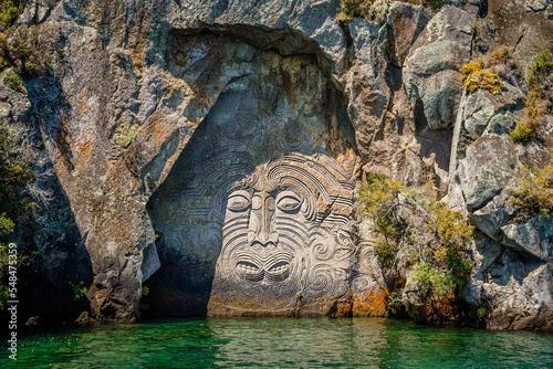 traditional rock carving lake taupo north island new zealand. High quality photo