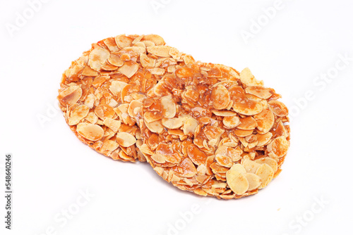 Almond florentine cookies on white background 