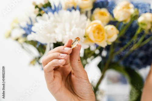 Vitamin D for building and maintaining healthy bones. Omega 3 pill of fish fat oil in hands close-up. BADS capsule of biologically active dietary supplements.