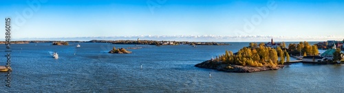 Aerial scenery panorama of an archipelago of islands with outbuildings and houses Gulf of Finland near city of Helsinki. Amazing natural landscape of Scandinavian nature. Copy text space