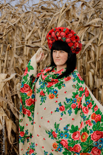 Ukrainian girl in a red wreath