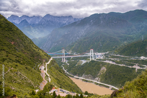 A bridge construction around the mountains of Northwest Yunnan at the Tiger Leaping Gorge between Lijiang and Shangri-la
