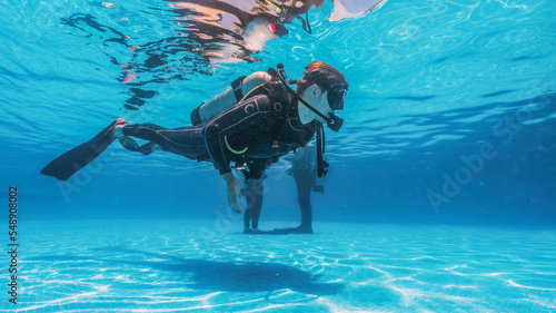 student doing scuba diving classes learning hover and buoyancy