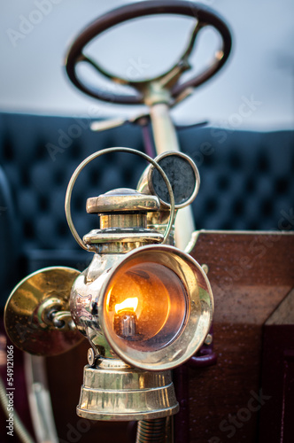 Gas headlight of vintage, veteran car on a classic car show in Brighton, East Sussex, UK