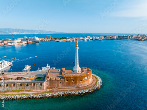 Messina, Sicily, Italy, August 20, 2022. View of the Messina's port with the gold Madonna della Lettera statue