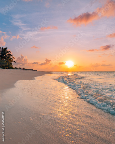 Peaceful nature scenic. Relax paradise, amazing closeup view of calm ocean bay waves with orange sunrise sunset sunlight. Tropical island vacation, holiday beach landscape exotic sea shore coast