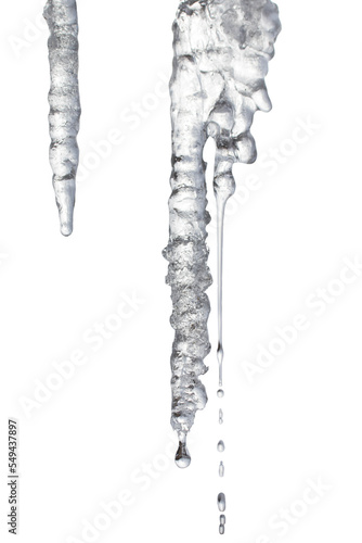 An icicle highlighted on a transparent background. Melting icicle with falling drops of water. PNG