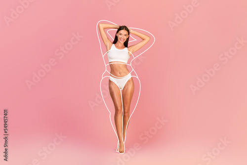 Liposuction Result. Young beautiful woman with slim body posing in underwear