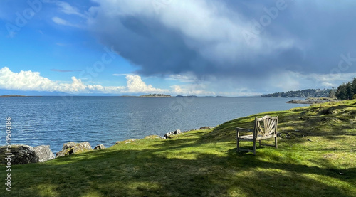 A bench looking at the Pacific Ocean on the East Coast of Vancouver Island in Nanoose Bay, British Columbia, Canada