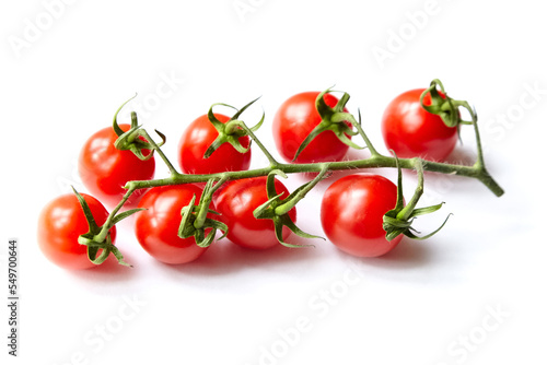 Cherry tomatoes cluster isolated on white. Fresh vegetable. Red cherry tomatoes on stem