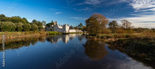 Ruins Of Desmond Castle on River Maigue in Adare, county Limerick, Ireland