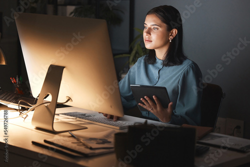 Night office, computer and business woman with tablet for digital marketing, seo analytics and multimedia application review. Website design, graphic designer and creative employee in dark workspace