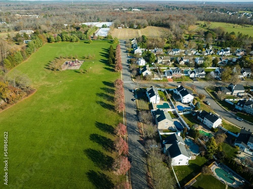 Drone shot of beautiful houses in Freehold, New Jersey, United States in summer