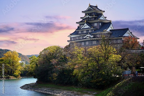 Okayama castle and twilight sky in the Autumn season of Okayama city, Japan.