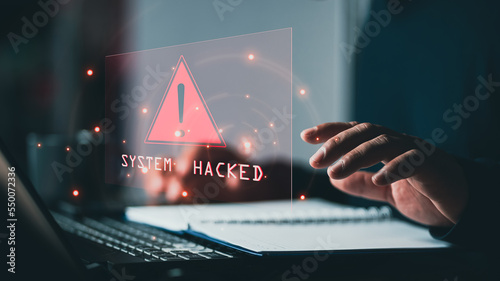 System hacked alert after cyber attack on computer network. compromised information concept. internet virus cyber security and cybercrime. hackers to steal the information is a cybercriminal