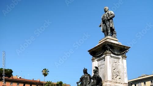Monument dedicated to Camillo Benso di Cavour in the homonymous Roman square with statues at the base and a statue of the statesman on top. Made for the 25th anniversary of the liberation of Rome