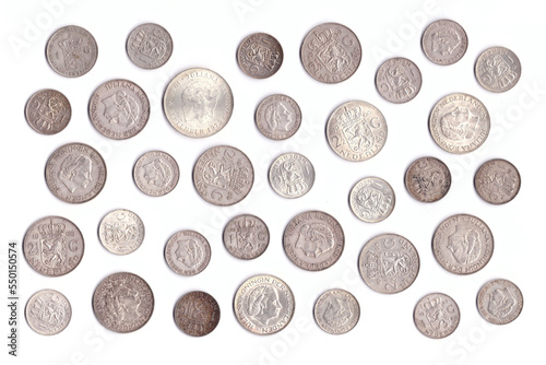 Collection of old Dutch silver coins, mainly guilder (gulden) and 2.5 guilders (rijksdaalder) from around 1950 to 1965, depicting queen Juliana, isolated on white