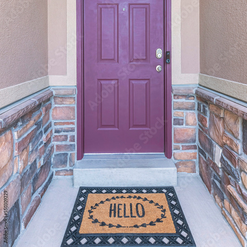 Square Purple front door with arched transom window and digital key access