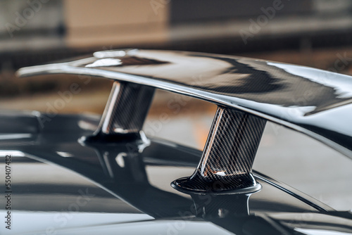 Rear carbon fiber spoiler on a car