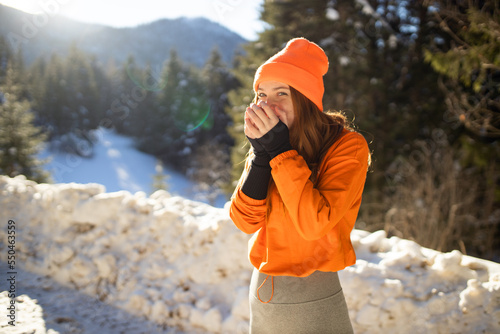 Woman warming up at winter for running