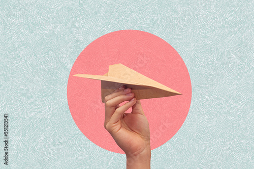 Hand holding a paper plane on a circle background. Ideas for travel. Art collage.
