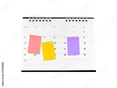 three colourful sticky notes on cardboard desk calendar page with date isolated on transparent, monthly business deadline planning or event reminder schedule