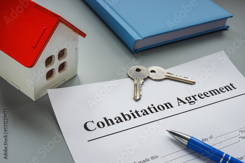 Cohabitation agreement, keys and model of home.