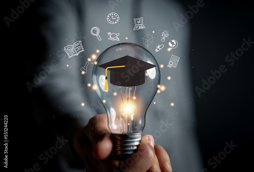 E-learning graduate certificate program concept. man hands showing graduation hat, Internet education course degree, study knowledge to creative thinking idea and problem solving solution